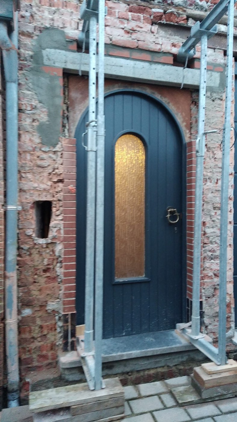 Nieuwe gevel met boogdeur, foto 7